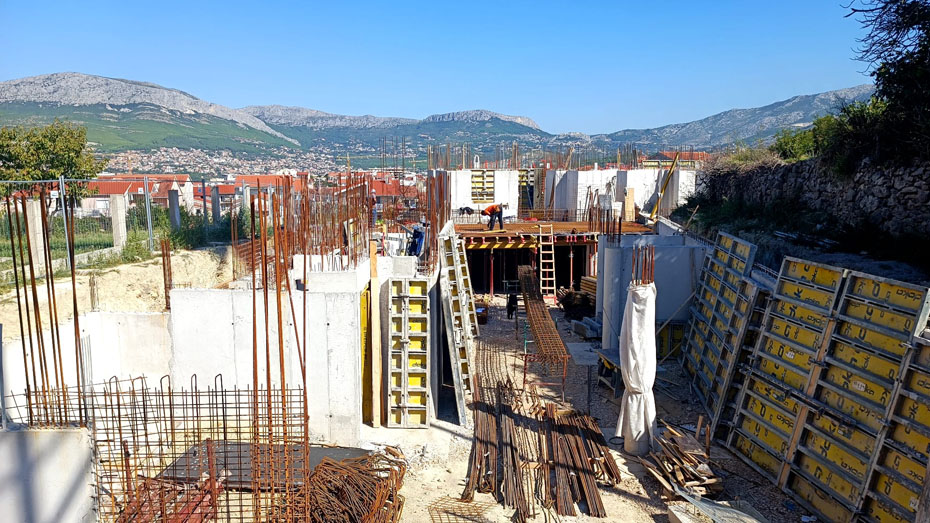 Prikazi izgradnje modernih stambenih i poslovnih prostora, iskopa, uređenja okoliša i drugih usluga